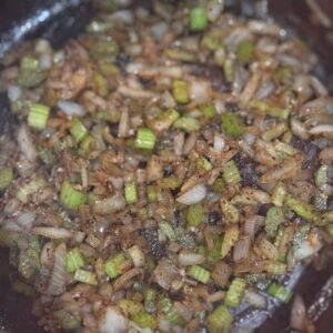 Slow cooked beef shin with red wine, baby carrots & onions