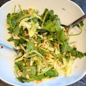 Salad bowl of Truly Yummy Watercress & Fennel Salad dressed in an orange dressing